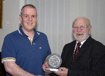 Iwan Williams receiving the Bobby Haines Image of The Year Trophy from Club President Bobby Haines